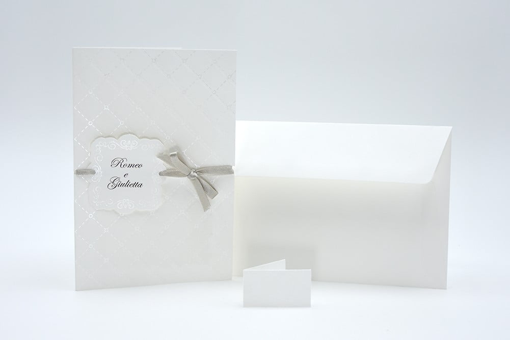 Partecipazione nozze classica carta bianca con rombi