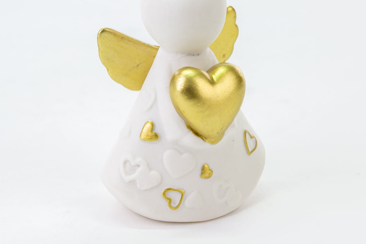 Bomboniera angelo bianco con cuore oro