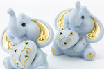 Bomboniera elefante celeste decori oro