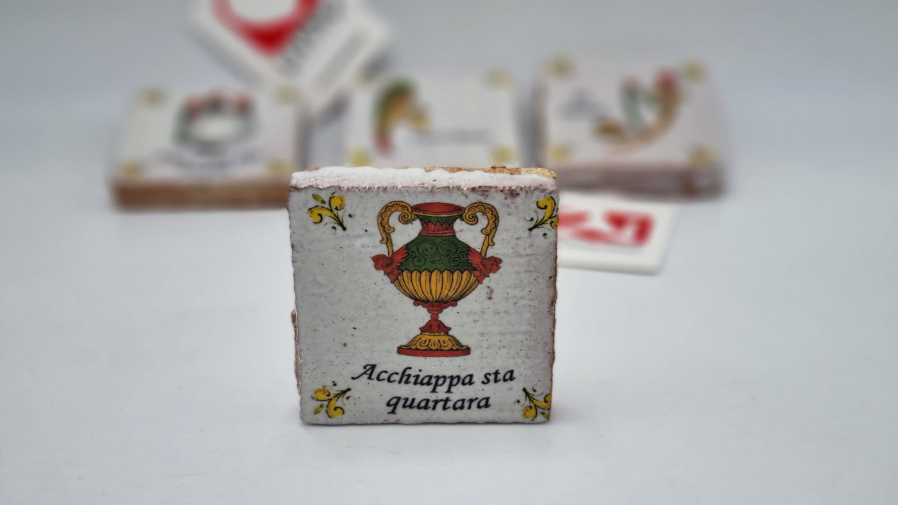 Bomboniera set 4 assi in ceramica