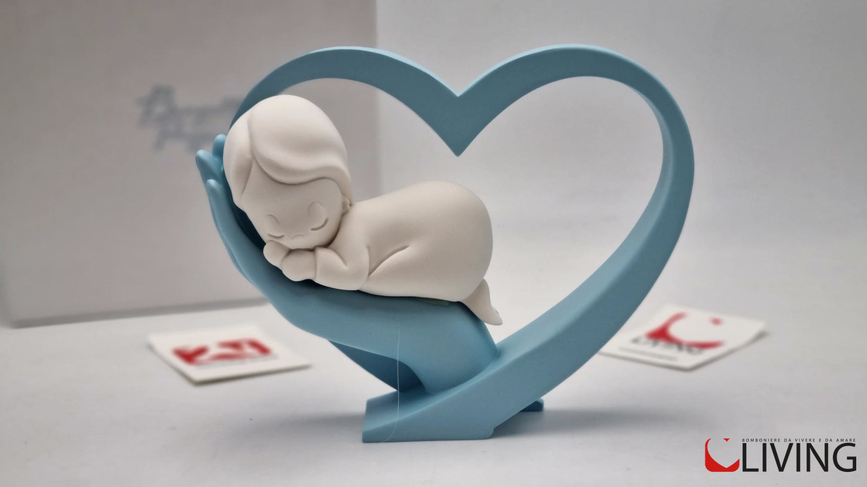 bomboniera cuore celeste con bimbo