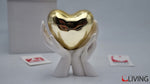 bomboniera mani bianche con cuore oro