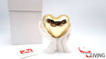 bomboniera mani bianche con cuore oro