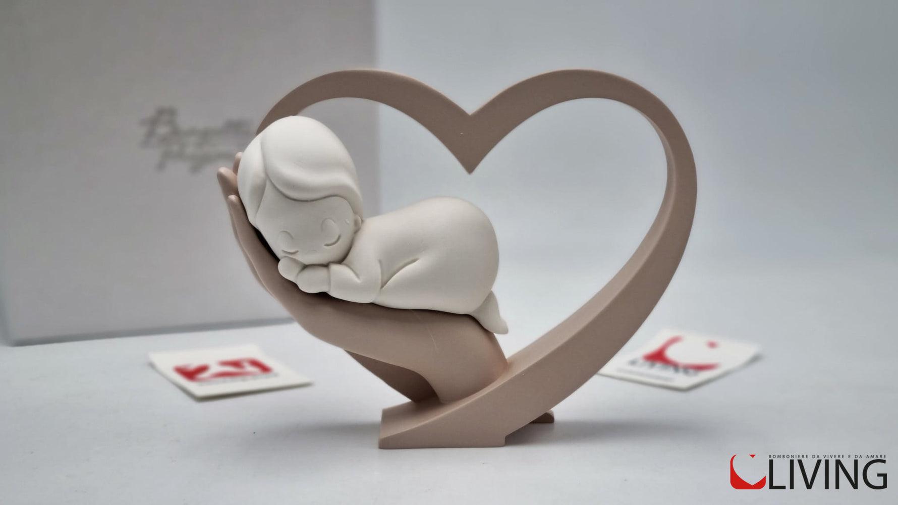 bomboniera cuore rosa cipria con bimbo