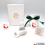 bomboniera linea solidale lilt living clessidra con mani linea dono