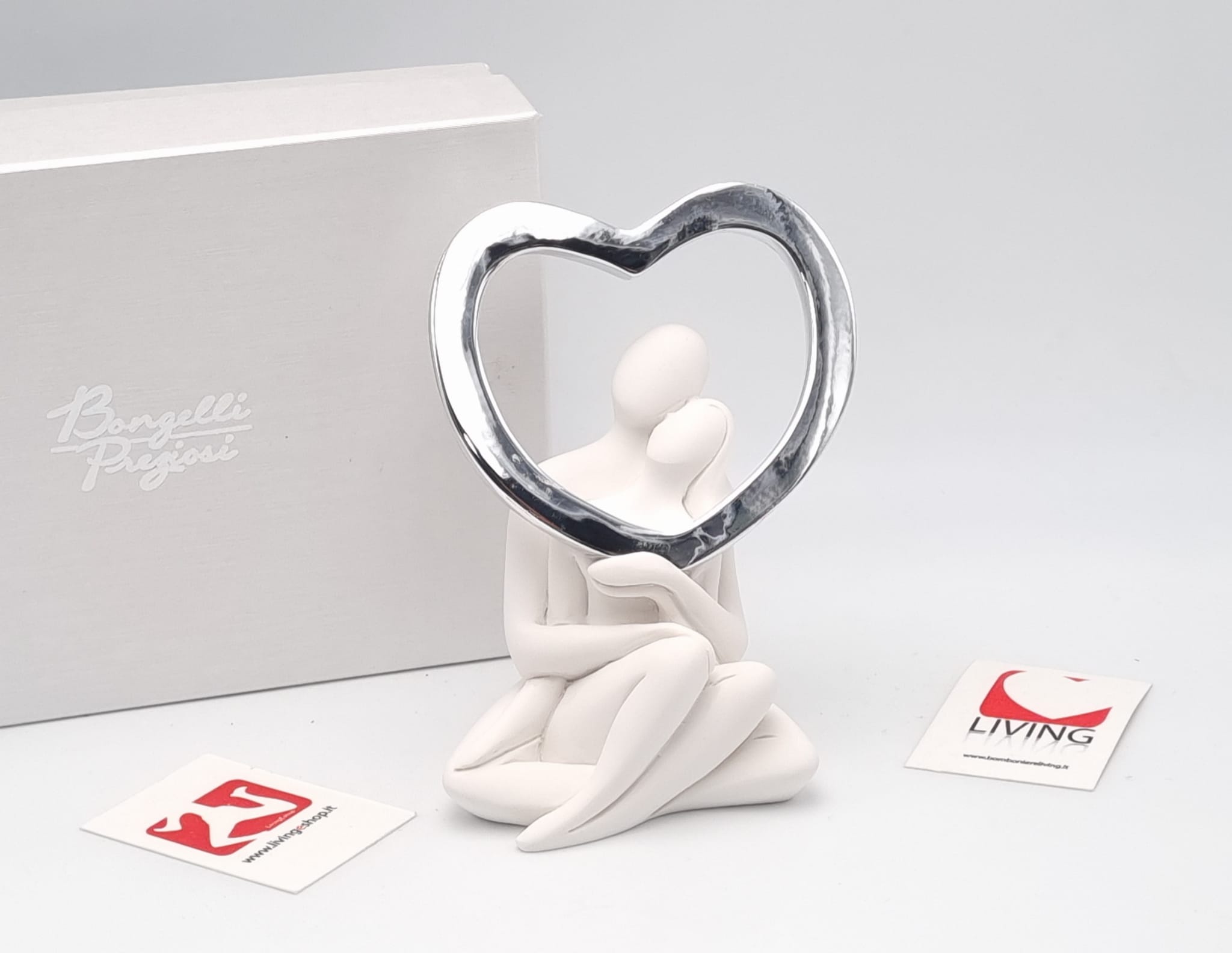Coppia sposi in polvere di marmo con cuore argento