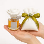 bomboniera profumatore in vetro con camelia in gesso