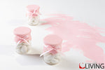 Barattolo in vetro con coperchio in silicone rosa