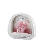 bomboniera lampada led mani con piedini rosa in marmorino