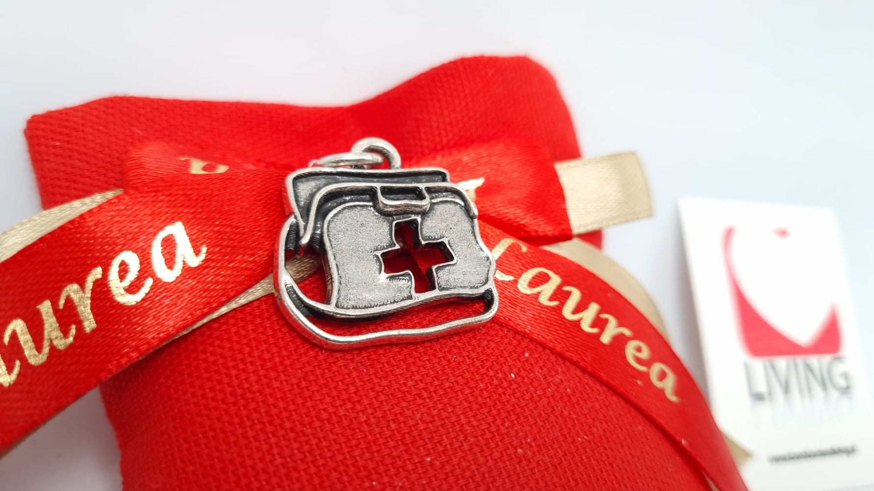 Bomboniera laurea charm borsa in metallo