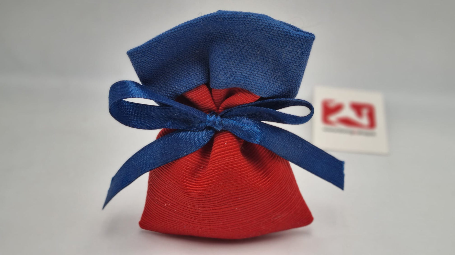 Sacchetto laurea in  tessuto rosso e blu