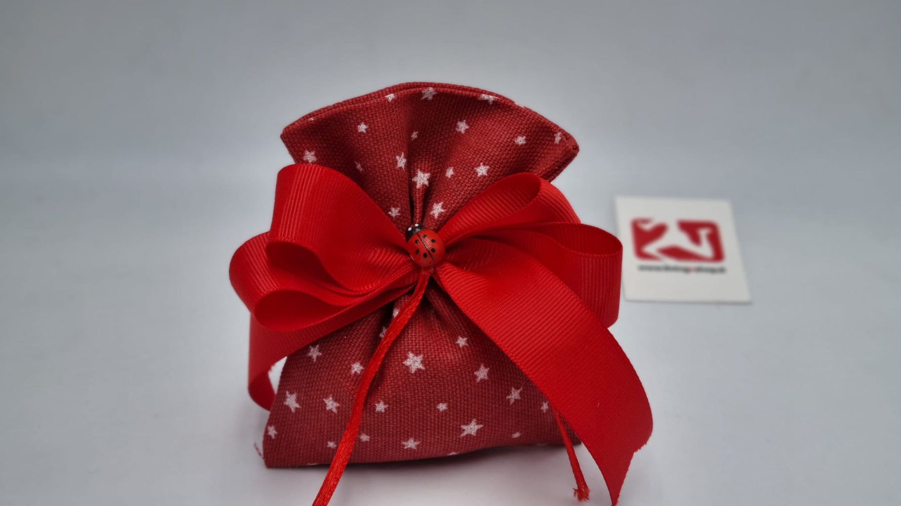 Sacchetto retto in tessuto rosso con stelline