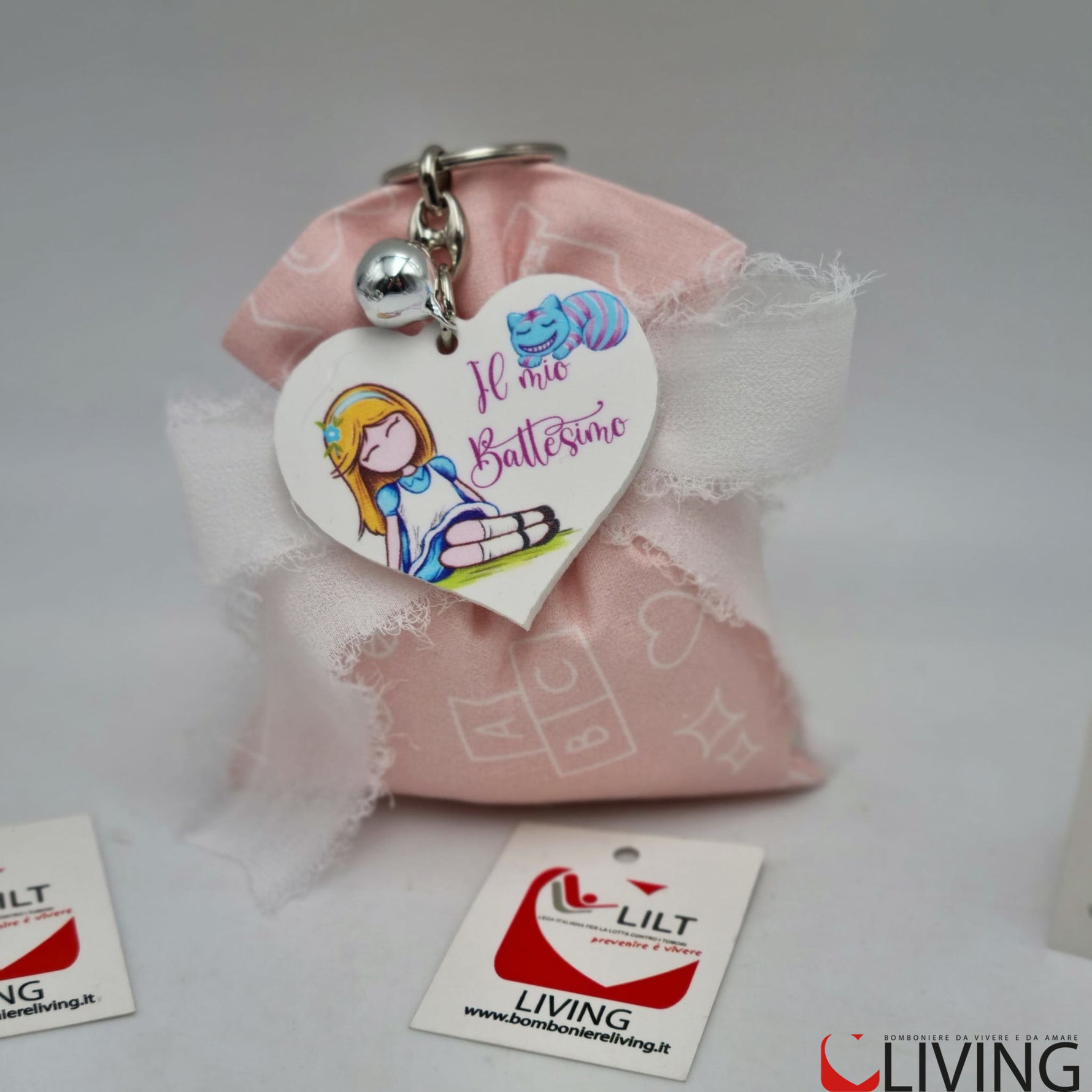 bomboniera linea solidale lilt living sacchetto con portachiavi bimba battesimo