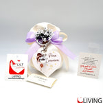 bomboniera linea solidale lilt living sacchetto con portachiavi bimba comunione