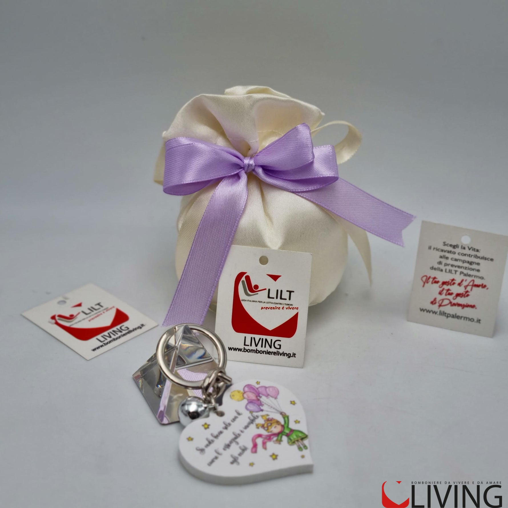 bomboniera linea solidale lilt living sacchetto con portachiavi bimba