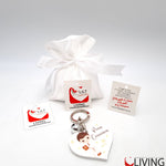 bomboniera linea solidale lilt living sacchetto con portachiavi bimbo comunione
