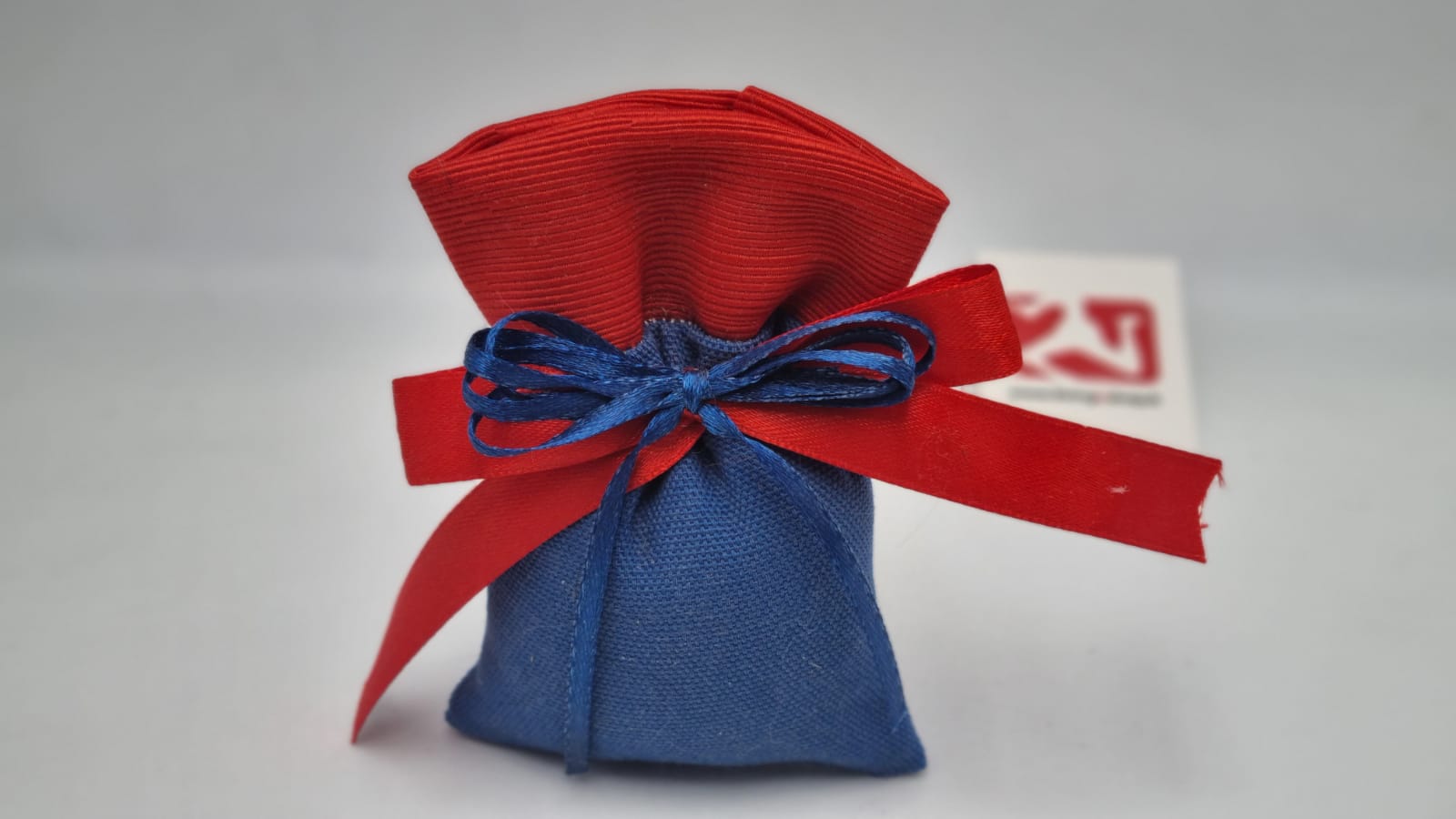 Sacchetto laurea  blu con fascia cannetè rosso