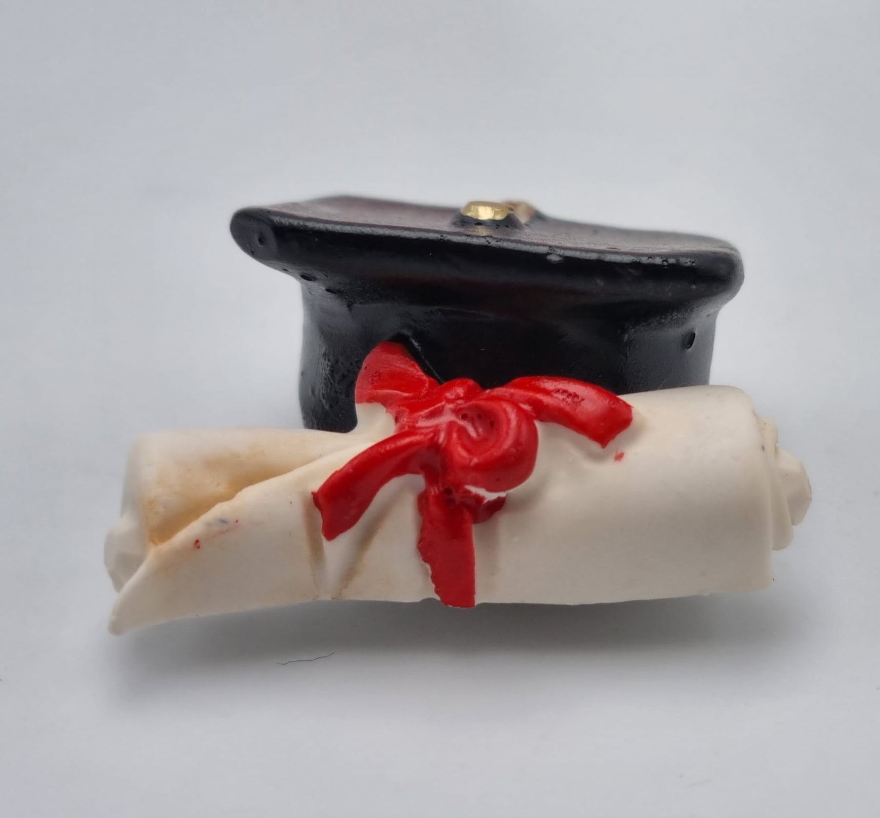 Tocco con pergamena in resina con magnete